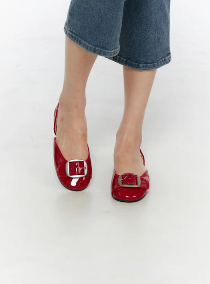 LEWKIN Buckle Detail Flats CU530 Red close-up shot on model wearing blue denim cropped jeans, patent leather with silver square buckle, aerial view