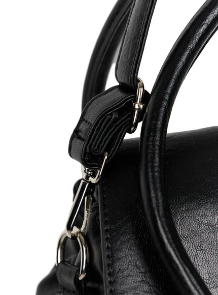 Buckle Faux Leather Shoulder Bag IL523 Black One Size product overview showing dual top handles flap closure silver buckles and side pockets