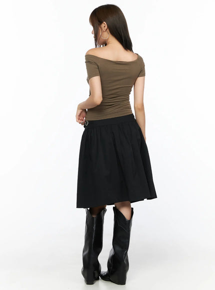 Buckle Midi Skirt CL517 Black full-body back model shot showing rear view of gathered skirt, back of wide waistband, and side buckle accent with cowboy boots