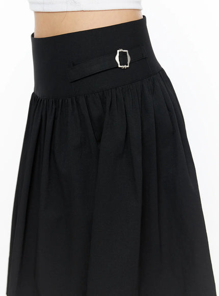 Buckle Midi Skirt CL517 Black close-up detail shot of wide waistband featuring silver rectangular buckle hardware and gathered fabric below