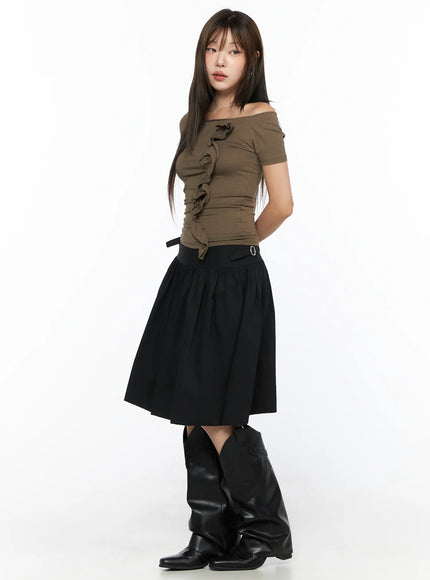 Buckle Midi Skirt CL517 Black full-body side model shot with model turning slightly, showing silhouette of gathered midi length and waistband buckle