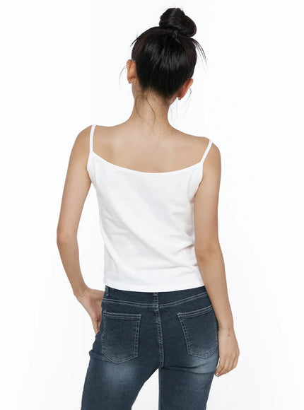 Button Sleeveless Top CL510 White back view on model showing clean scoop back thin spaghetti straps and straight hemline paired with dark jeans