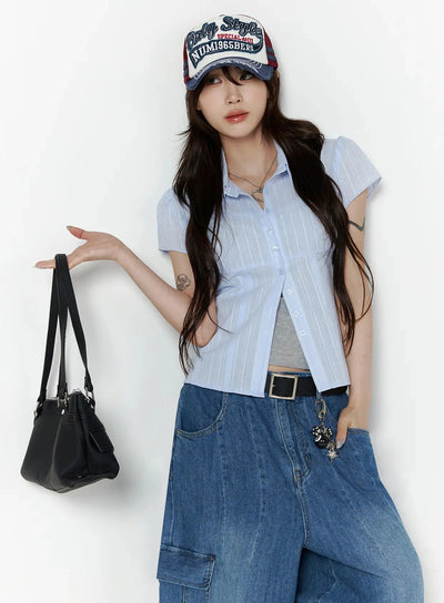 LEWKIN Button Up Linen Summer Blouse IL506 Light blue S/M cropped front shot on model wearing cap and cargo jeans holding black bag