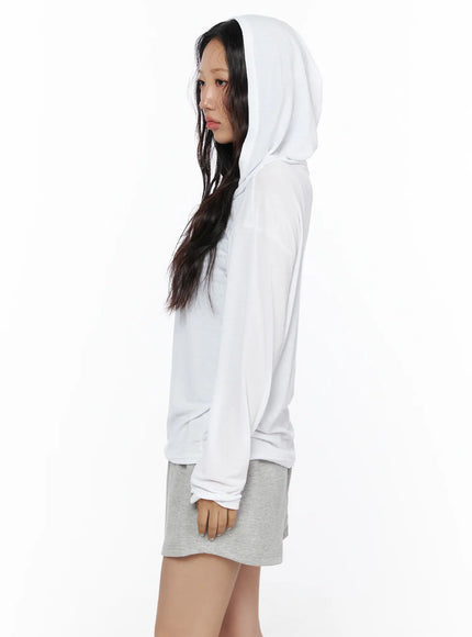 Button-Up Sheer Hoodie Top CL513 White side view model hood up showing relaxed sheer silhouette long sleeves and hem length paired with gray shorts