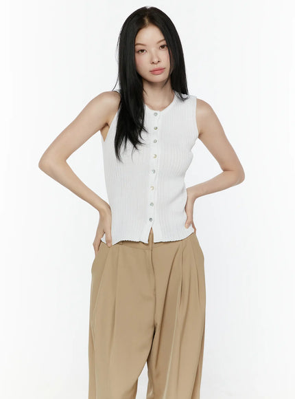 Button-Up Tank Top IL506 White front shot on model with hands on hips, cropped ribbed knit button-up vest showing fitted bodice