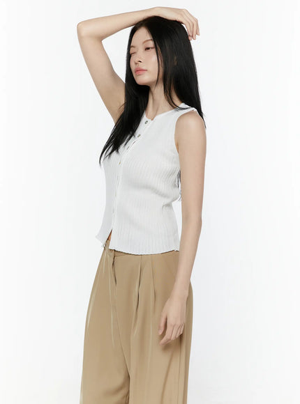 Button-Up Tank Top IL506 White side shot on model with arm raised overhead, showing ribbed knit silhouette and fitted waist