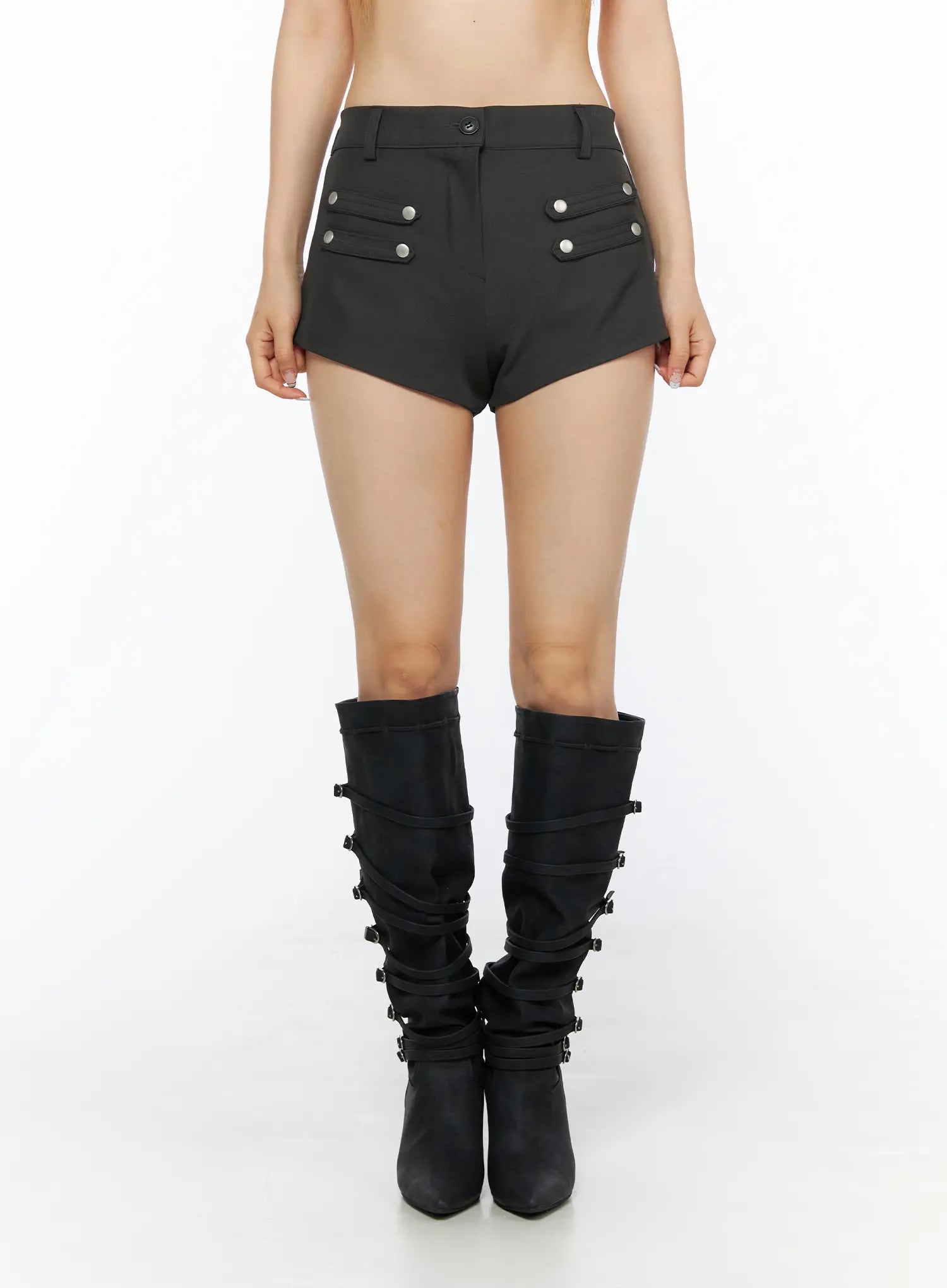 Buttoned Military High Waist Shorts CL502 Dark gray front shot on model showing symmetric silver snap button pocket flaps, high waist, and asymmetric hem