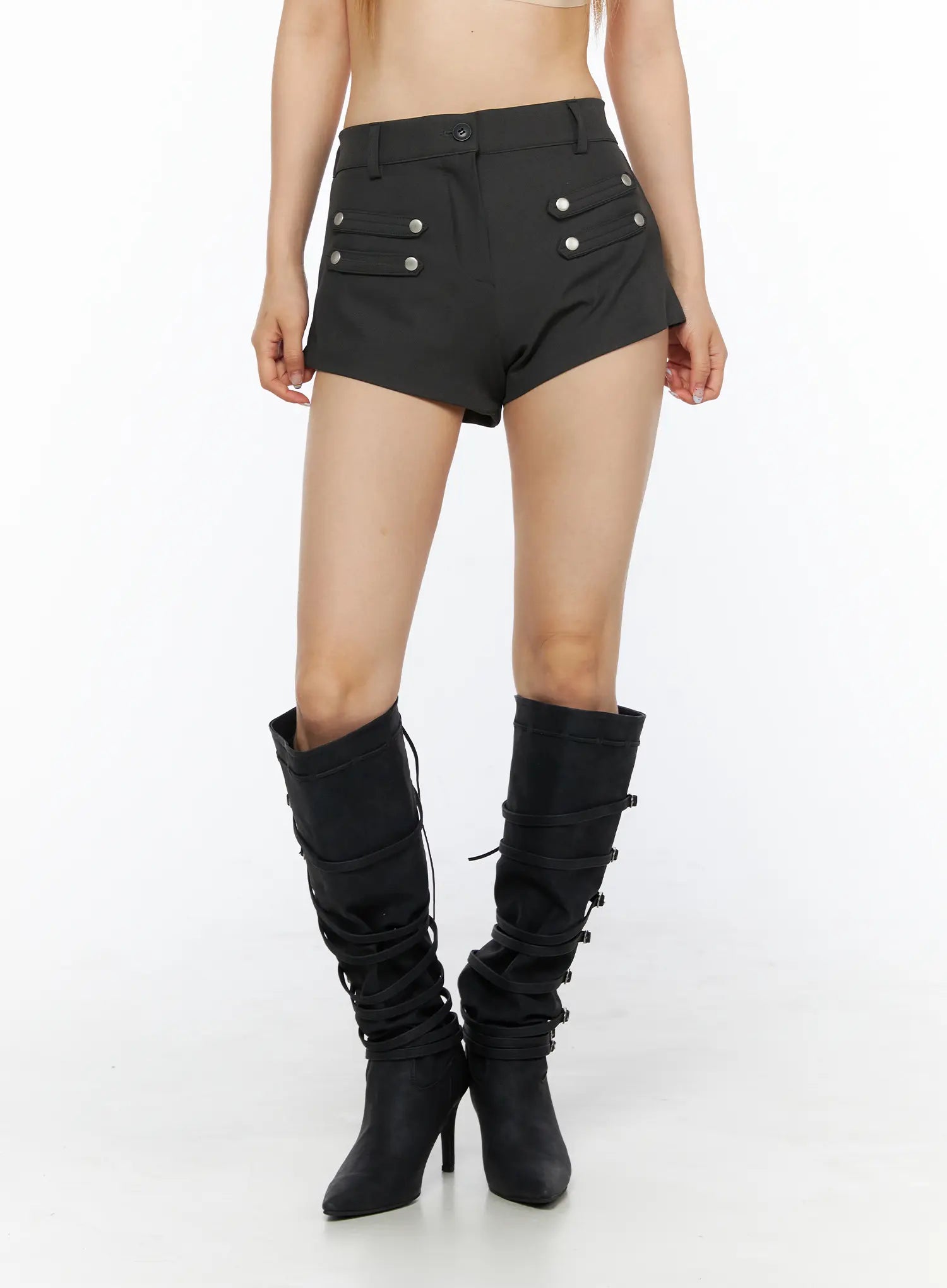 Buttoned Military High Waist Shorts CL502 Dark gray front close-up on model showing silver snap button pocket details, waistband, and asymmetric hem