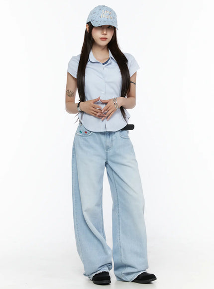 Camden Flower Ball Cap IL503 light blue full-body model shot styled with blue pinstripe shirt and wide-leg light wash jeans, front-facing casual outfit