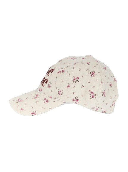 Camden Flower Ball Cap IL503 cream side product shot showing profile and brim shape, pink ditsy floral print covering entire cap including visor