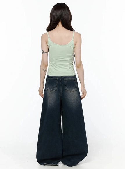 Cami Tank Top IL506 Mint back shot on model showing low scoop back neckline, thin spaghetti straps, and ruched side seam detail, with wide-leg jeans