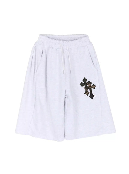Camo Cross Patch Bermuda Shorts IU524 Light gray flat-lay front view of complete wide-leg bermuda shorts with drawstring waist and camo cross patch, alternate lighting angle