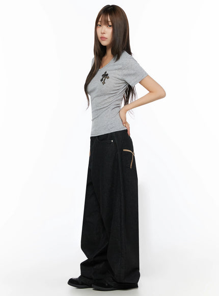 Camo Cross V-Neck Side Shirring Slim Tee IL515 Gray side model shot showing slim ribbed silhouette, cross patch on chest, side shirring detail visible, styled with wide-leg black denim