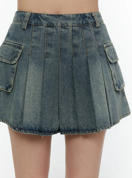 Cargo Pleated Vintage Wash Denim Skirt CL507 Blue close-up front detail shot on model showing pleats waistband and dual cargo pocket texture