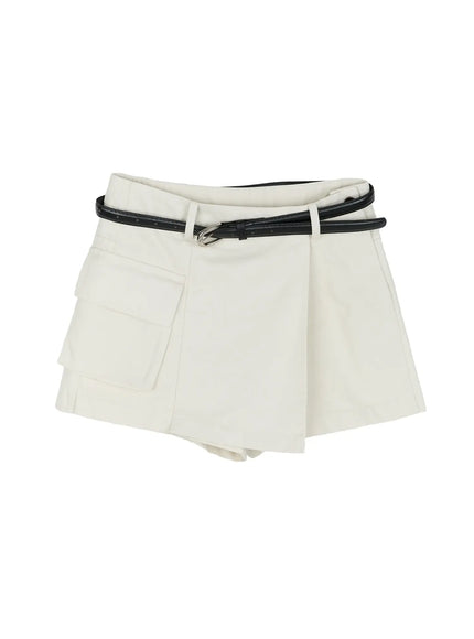 Cargo Pocket Wrap Skirt IL522 Light beige flat-lay front view showing asymmetric wrap overlap, cargo flap pocket, and included black leather belt