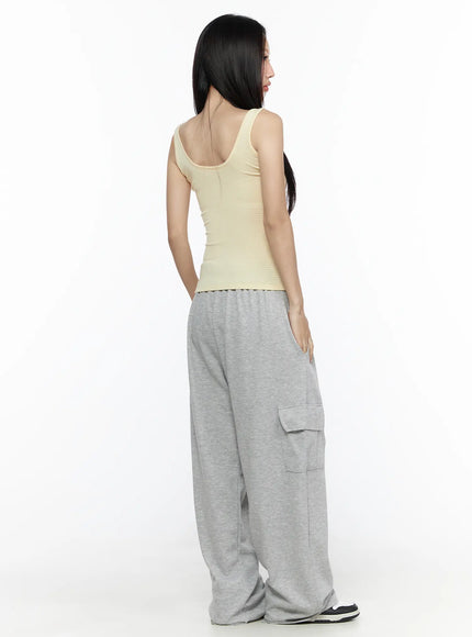Cargo Wide Leg Sweatpants CL524 Gray full-body back shot on model in yellow tank top showing rear cargo flap pockets elastic waistband and pooling wide-leg hem