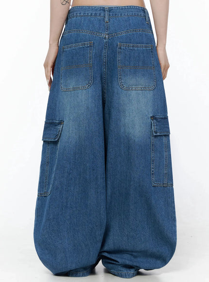 Carla Wide Cargo Jeans IL506 Blue back shot on model showing large square back pockets, yoke seam, and side cargo pockets on wide-leg denim
