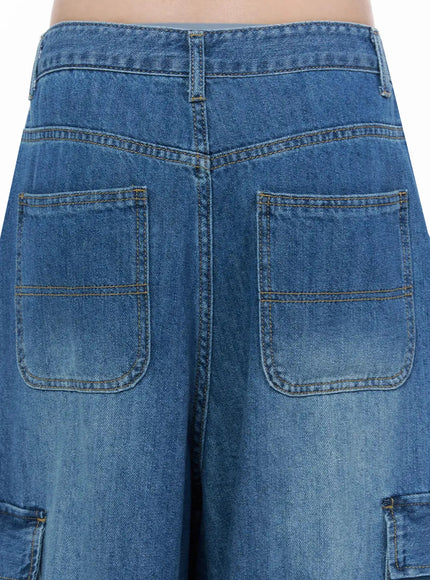 Carla Wide Cargo Jeans IL506 Blue close-up back detail shot showing dual back patch pockets with gold topstitching and faded wash waistband
