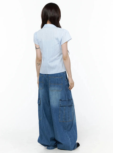 Carla Wide Cargo Jeans IL506 Blue back shot on model in light blue striped shirt revealing large back patch pockets and side cargo pockets