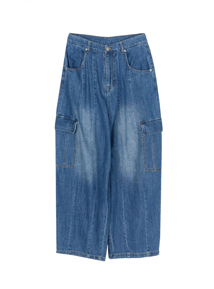 Carla Wide Cargo Jeans IL506 Blue flat-lay front view showing full silhouette with dual cargo flap pockets, pintuck seams, and washed denim finish