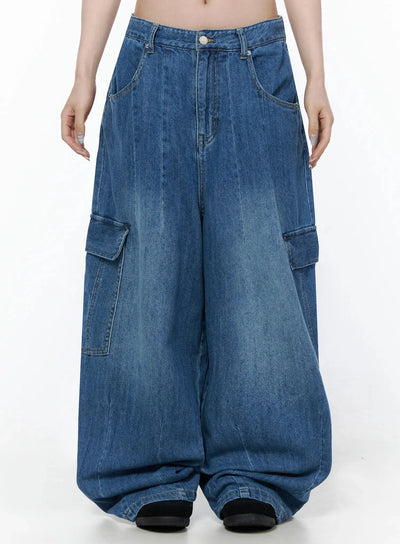LEWKIN Carla Wide Cargo Jeans IL506 Blue Size S front shot on model cropped at waist showing wide-leg silhouette, cargo pockets, and faded denim texture