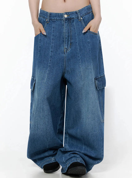 Carla Wide Cargo Jeans IL506 Blue front shot on model hands in pockets highlighting waistband button closure, center crease seam, and wide balloon leg