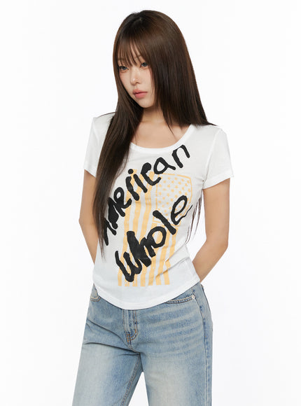 Casual Graphic Short Sleeve Tee IL523 White half-body front shot on model with hands tucked behind back showing scoop neckline and yellow flag graphic detail