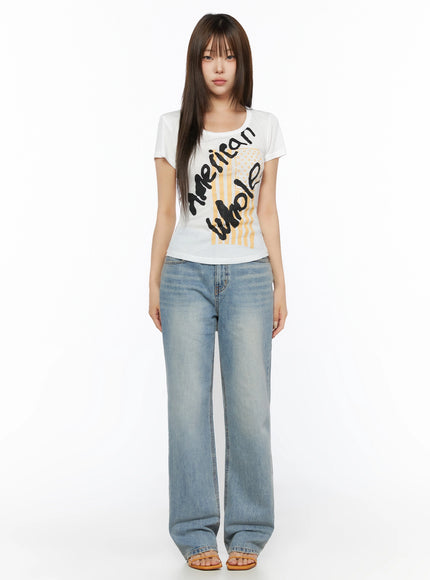 Casual Graphic Short Sleeve Tee IL523 White full-body front shot on model standing upright arms at sides showing fitted jersey fabric with wide-leg jeans and sandals