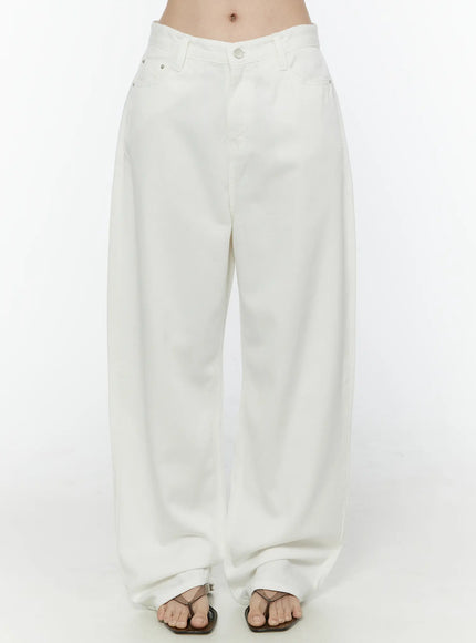 LEWKIN Casual Low-Rise Wide Leg Cotton Pants IL506 White front close-up on model showing V-shaped waistband, button closure, and wide-leg silhouette with thong sandals