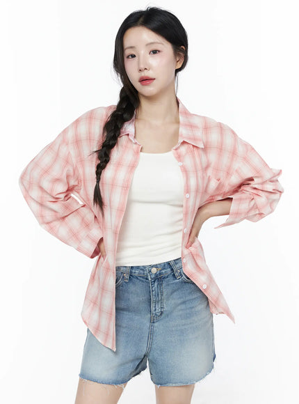 Casual Plaid Button-Up Shirt IU525 Pink front shot model hands on hips open oversized fit layered over white tank denim cutoff shorts braid hair