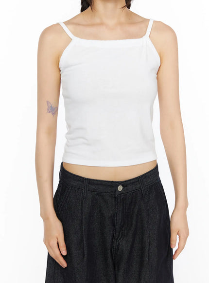Casual Sleeveless Top CU530 White close-up front shot on model, square neckline with thin straps, ribbed knit fabric, cropped hem above waist paired with dark denim