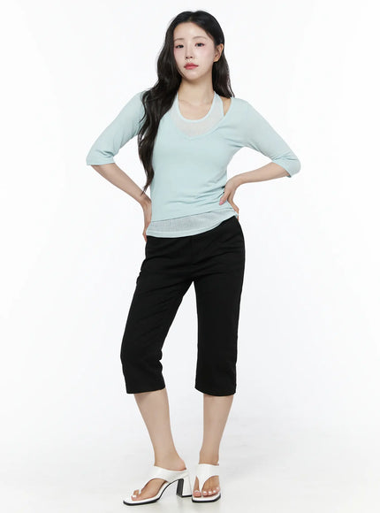 Casual Slim-Fit Capri Pants IU525 Black full-body front view on model with hands on hips styled with mint layered top and white heeled sandals