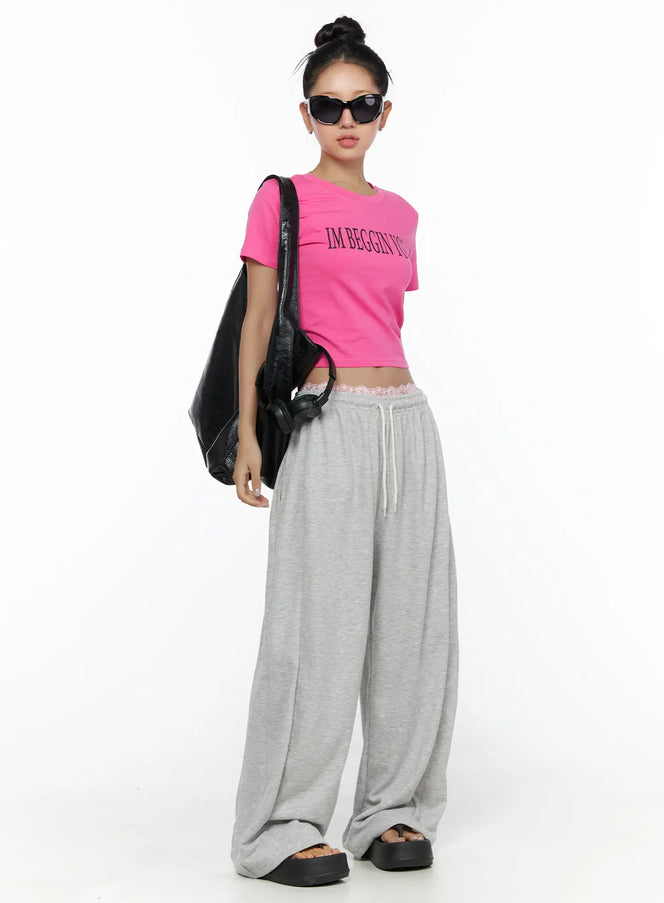 LEWKIN Casual Wide Leg Sweatpants CL513 Gray full-body front shot on model standing upright styled with pink crop tee black bag and sunglasses