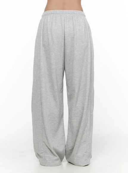 Casual Wide Leg Sweatpants CL513 Gray back full-body shot on model showing elastic waistband lace trim and voluminous wide leg hem pooling at floor