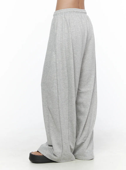 Casual Wide Leg Sweatpants CL513 Gray side shot on model from hip to ankle showing wide leg silhouette and pintuck seam detail