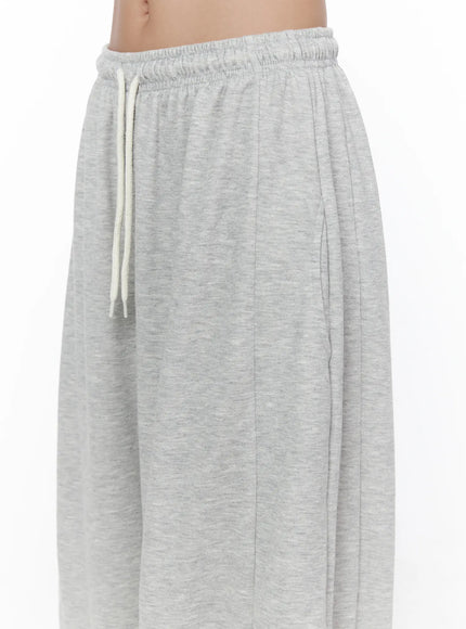 Casual Wide Leg Sweatpants CL513 Gray close-up side detail showing seam pintuck elastic waistband and white drawstring on model