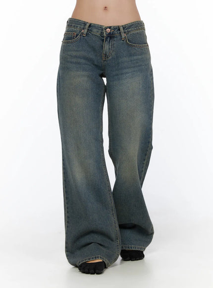 Cedar Vintage Wash Low-Rise Straight Jeans CL510 blue denim front close-up on model from waist to hem showing low-rise fit, wide straight leg and overall vintage wash fade