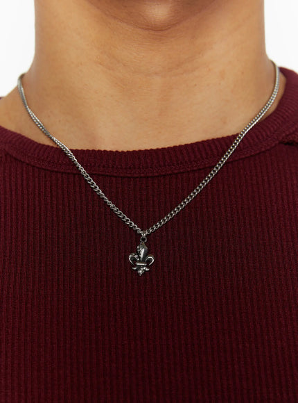 Chain Pendant Necklace IL509 silver close-up detail on model wearing burgundy ribbed crew-neck tee, fleur-de-lis crystal pendant