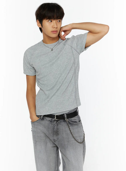 LEWKIN Chain Pendant Necklace IL509 silver front view on male model wearing grey ribbed tee and grey jeans, hand raised to neck