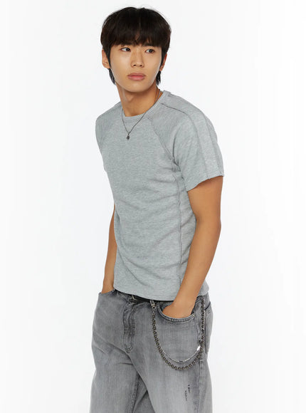 Chain Pendant Necklace IL509 silver side view on male model in grey ribbed tee, hands in pockets, raglan seam detail visible