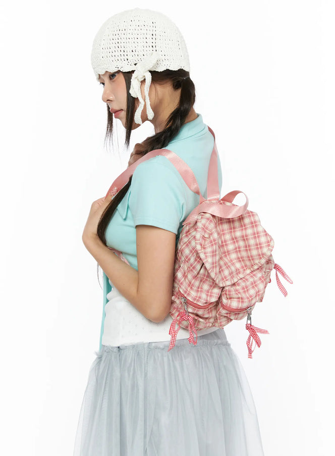 Checked Ribbon Backpack CL517 Pink side view on model wearing teal top and gray tulle skirt with bag worn on back over shoulder