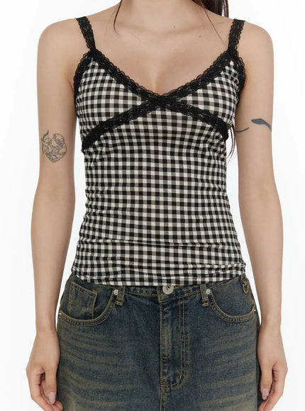 Checkered Lace Trim Tank CL508 White close-up detail shot on model showing black lace cross trim neckline and gingham check pattern with spaghetti straps