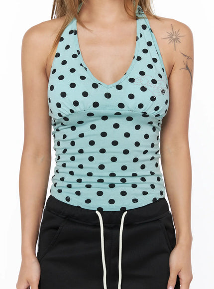 Chic Polka Dot Halter Top CU524 Mint close-up front detail shot on model showing V-neck, bust seam, rhinestone logo embroidery