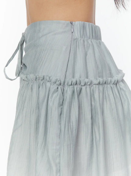 Chiffon Flare Mini Skirt CU526 Light blue close-up back detail on model showing concealed back zipper, ruched elastic band, and crinkle chiffon texture