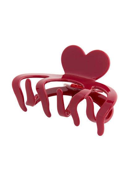Clara Hair Clip IL503 burgundy red side angle view showing heart topper profile and interlocking curved claw teeth glossy acrylic