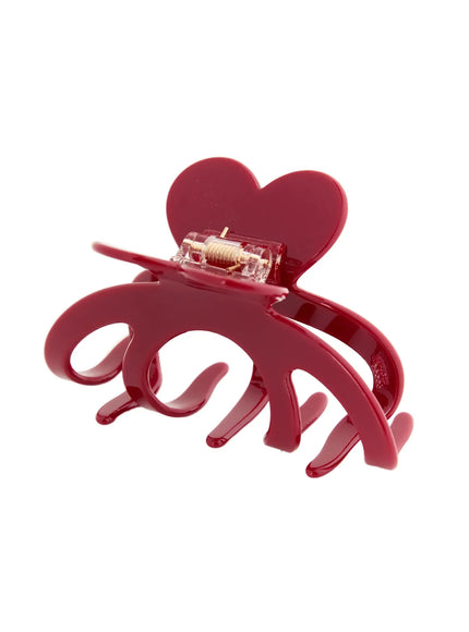 Clara Hair Clip IL503 burgundy red angled top view showing gold spring hinge mechanism and open claw teeth glossy acrylic finish