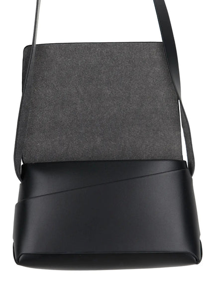 Classic Faux Leather Crossbody Bag IL523 Black close-up detail shot showing open flap with grey suede-like interior lining and strap on white background