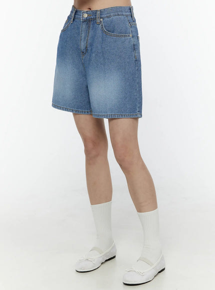 Classic Jorts IL506 Blue side view on model, high-waist relaxed-fit denim shorts showing side pocket detail and faded wash texture
