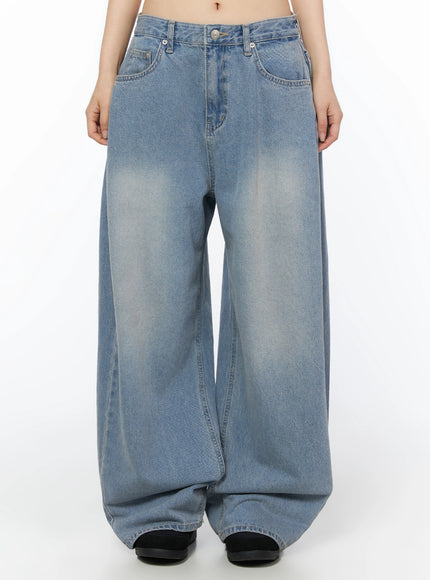 LEWKIN Coleen Side Pleat Baggy Jeans IL502 Blue Size S front view on model showing wide-leg silhouette with faded wash and five-pocket denim styling