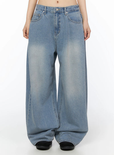 LEWKIN Coleen Side Pleat Baggy Jeans IL502 Blue Size S front view on model showing wide-leg silhouette with faded wash and five-pocket denim styling